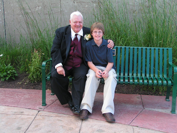 sam with grandpa at anns wedding)